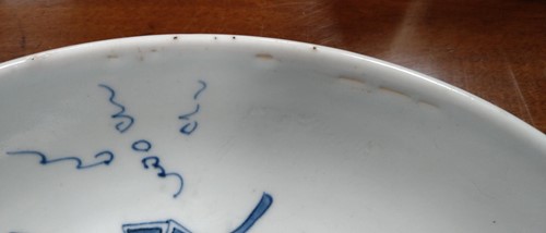 Lot 13 - A Chinese Kangxi-style blue and white shallow...