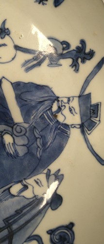 Lot 13 - A Chinese Kangxi-style blue and white shallow...
