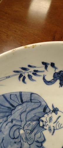 Lot 13 - A Chinese Kangxi-style blue and white shallow...