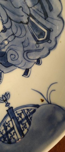 Lot 13 - A Chinese Kangxi-style blue and white shallow...