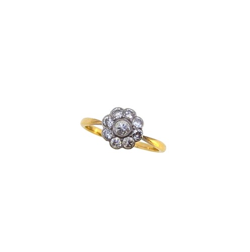 Lot 149 - An early 20th century diamond cluster ring