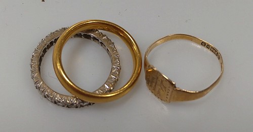 Lot 266 - A hallmarked 22ct gold wedding ring, weight...
