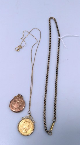 Lot 261 - A full sovereign dated 1965 on a chain stamped...