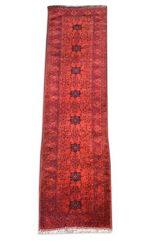 Lot 595 - A finely-woven Ersari runner rug