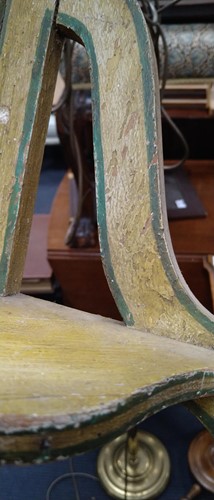 Lot 843 - A small elm rustic table with three legs and a...
