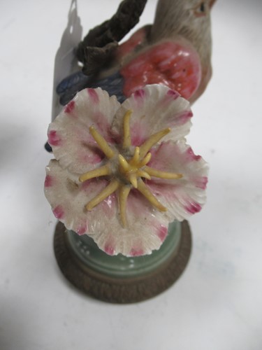 Lot 3 - A pair of 20th century porcelain and metalware...