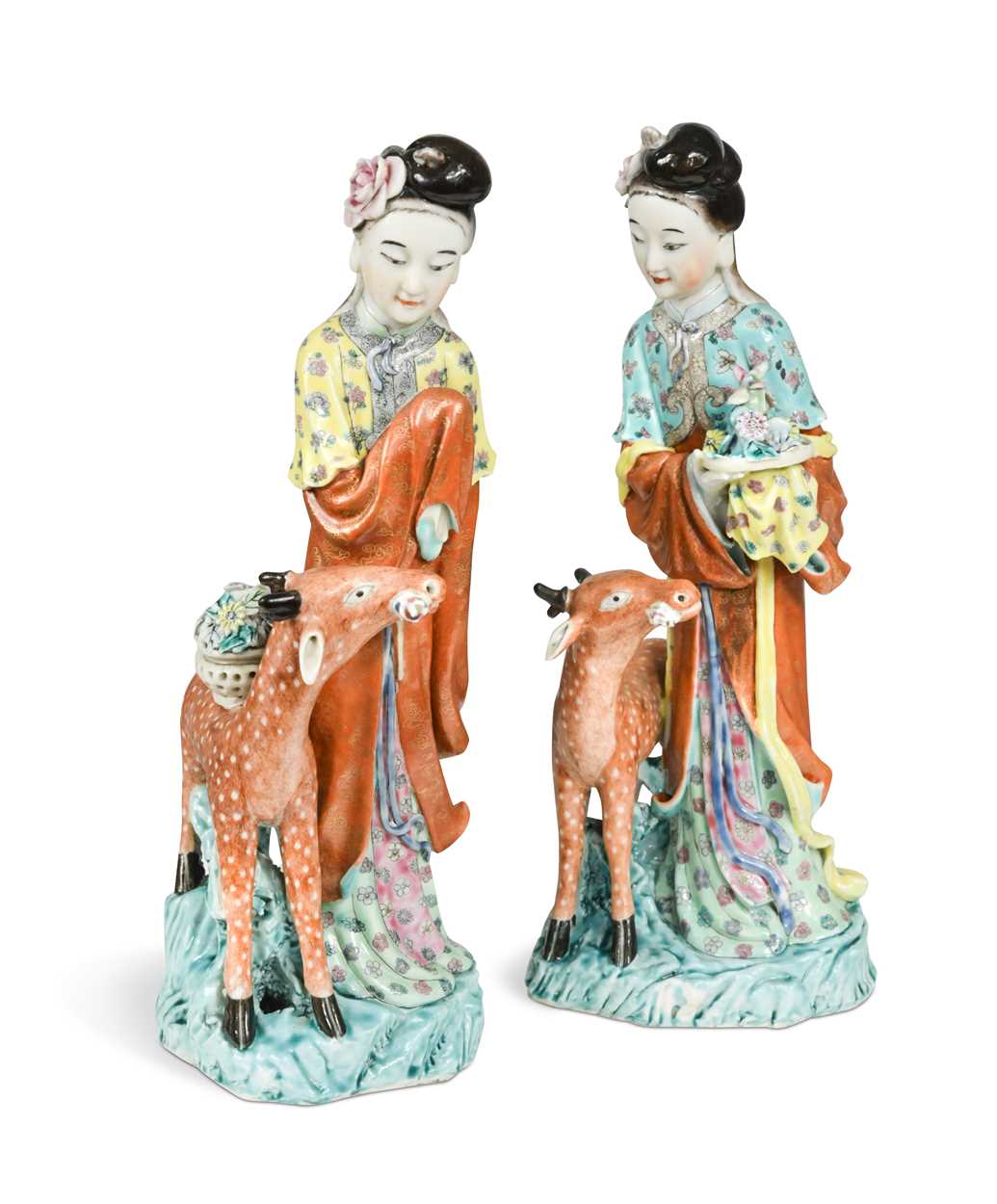 Lot 1 - Two similar Chinese enamelled porcelain figures of the Immortal Magu with deer, late Qing Dynasty