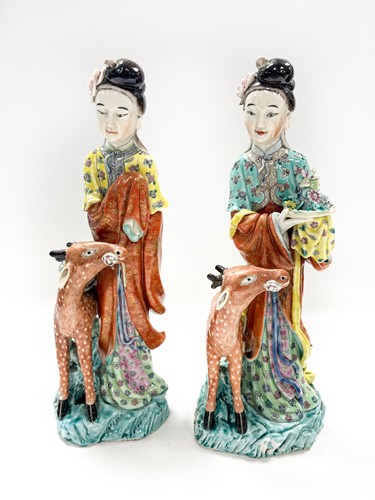 Lot 1 - Two similar Chinese enamelled porcelain figures of the Immortal Magu with deer, late Qing Dynasty