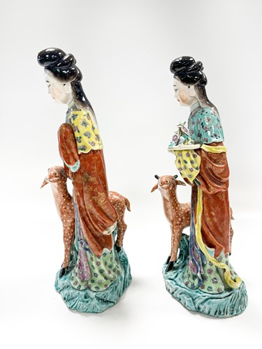 Lot 1 - Two similar Chinese enamelled porcelain figures of the Immortal Magu with deer, late Qing Dynasty