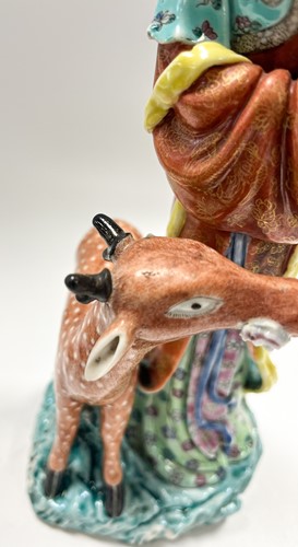 Lot 1 - Two similar Chinese enamelled porcelain figures of the Immortal Magu with deer, late Qing Dynasty