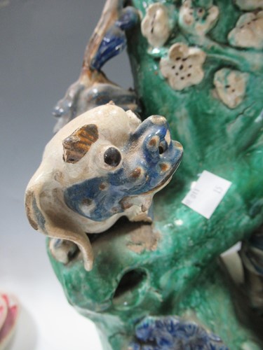 Lot 15 - An Oriental pottery vase decorated with a bird...
