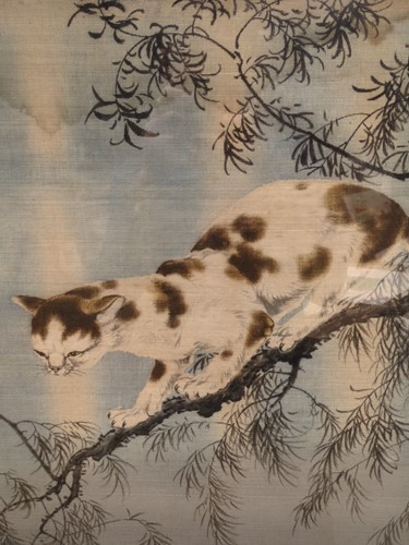 Lot 514 - A Japanese painting on linen of a wild cat in...