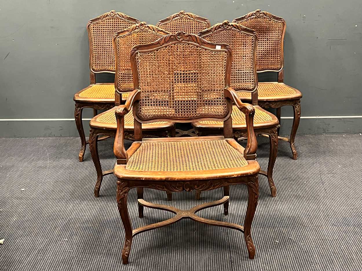 Lot 623 - A set of six French dining chairs with caned...
