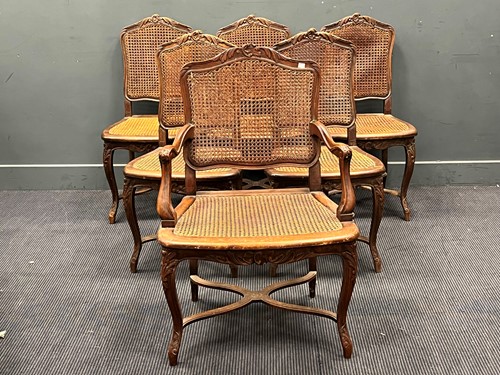 Lot 693 - A set of six French dining chairs with caned...