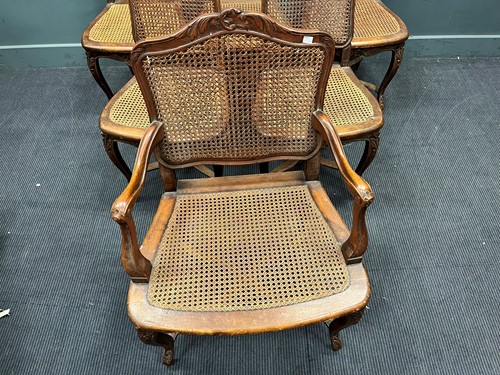 Lot 623 - A set of six French dining chairs with caned...