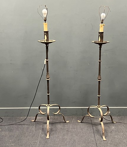 Lot 858 - A pair of metalware candlestands, (adapted for...