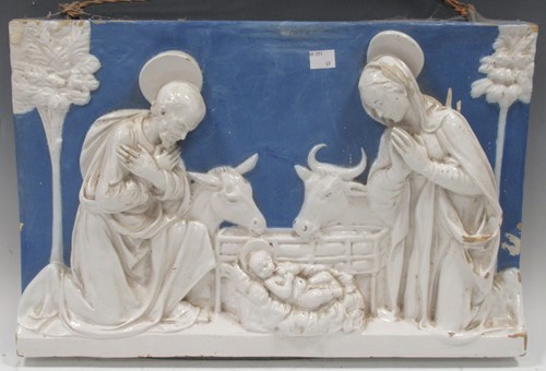 Lot 51 - A continental pottery plaque of the Nativity,...