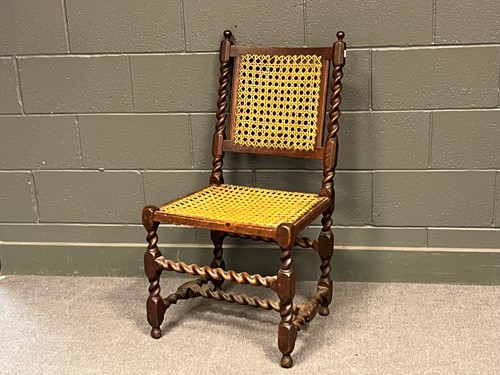 Lot 784 - An 18th century chair with barley twist frame