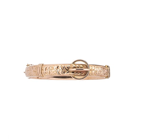 Lot 62 - An early 20th century 9ct gold buckle style bangle