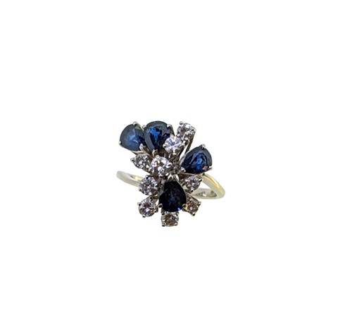 Lot 130 - A sapphire and diamond cluster ring