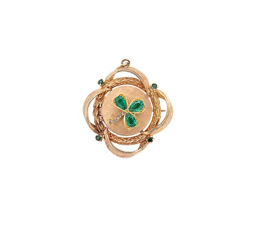 Lot 218 - A gemset shamrock locket/brooch