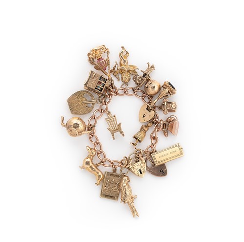 Lot 66 - A late 20th century 9ct gold charm bracelet