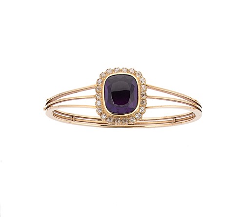 Lot 96 - An amethyst and diamond bangle