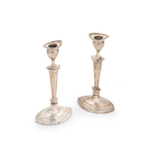 Lot 624 - A pair of Edward VII silver library candlesticks