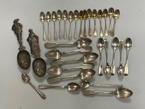 Lot 323 - A collection of continental metalware flatware...