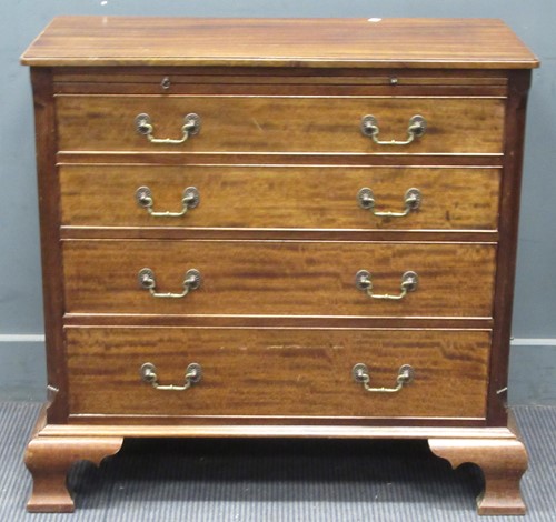 Lot 675 - A George III style reproduction mahogany chest...