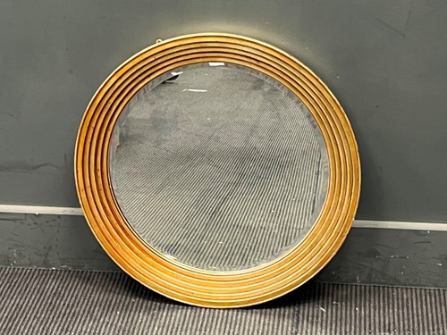 Lot 608 - A modern circular gilded mirror with stepped...