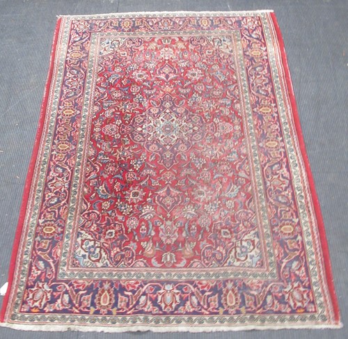 Lot 851 - A Persian style blue ground rug, (some wear)