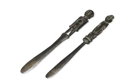 Lot 657 - A Massim carved wood lime spatula, Papua New Guinea 19th/early 20th century