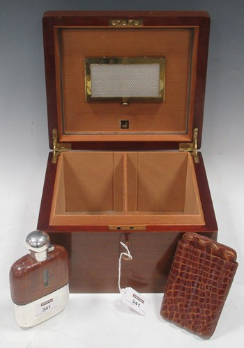 Lot 341 - A wooden cigar humidor by Dunhill, together...