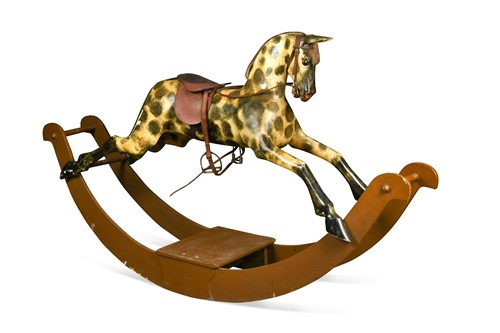 Lot 700 - A wooden painted rocking horse, early 20th century