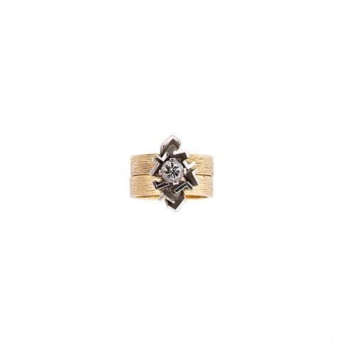 Lot 245 - A geometric style ring set