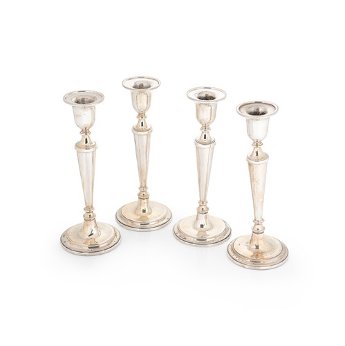 Lot 663 - A set of 4 Elizabeth II silver candlesticks