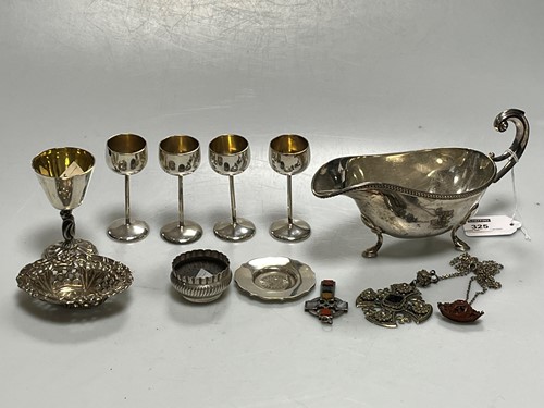 Lot 325 - A collection of silverware including a sauce...