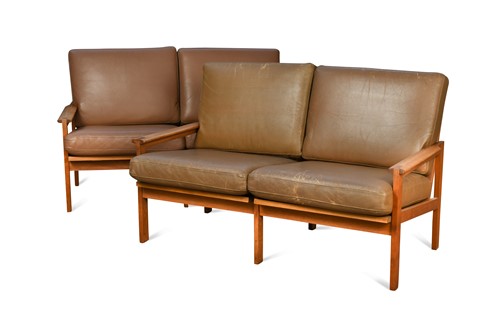 Lot 280 - Illum Wikkelso for Niels Eilerson, a pair of Danish Capella teak two-seater sofas