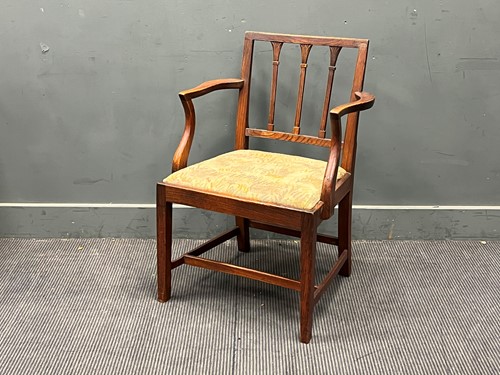Lot 543 - A George III provincial elm open armchair, a...