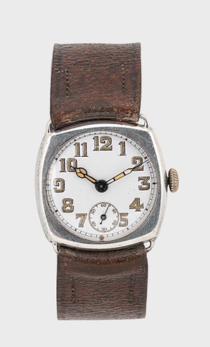 Lot 434 - Unsigned - A Swiss silver 'Trench' style wristwatch