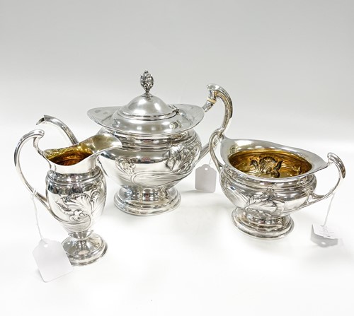 Lot 614 - A late Victorian silver Art Nouveau style 3-piece tea set