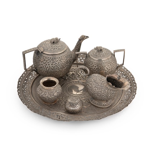 Lot 560 - A late 19th century Indian metalwares 6-piece tea set