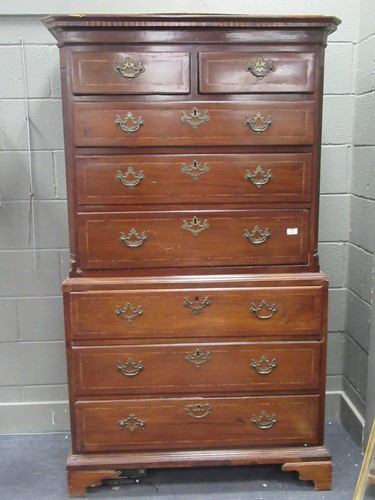 Lot 831 - A George III mahogany chest-on-chest with...