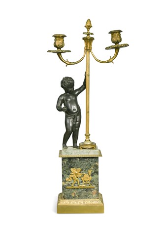 Lot 535 - A French gilt and patinated bronze twin branch figural candelabrum, 19th century