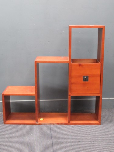 Lot 832 - A Modern unit. 106cms x 107cms wide x 30cms deep