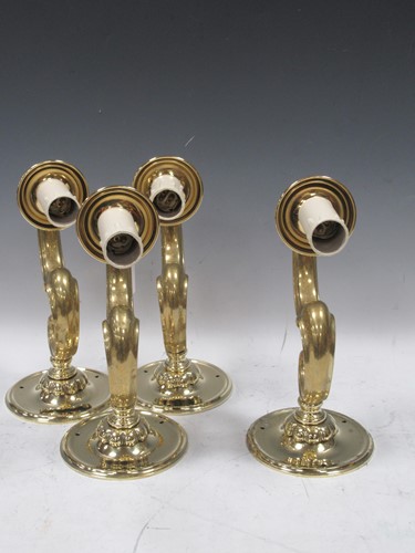 Lot 886 - A set of 4 modern polished brass wall light...