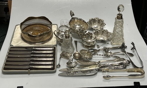 Lot 310 - A collection of silver including pin trays,...