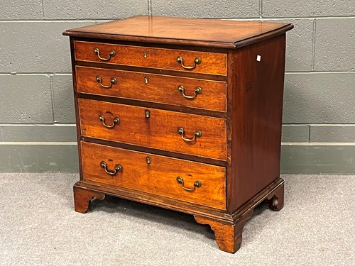 Lot 718 - A mahogany 4 drawer chest in Georgian style....