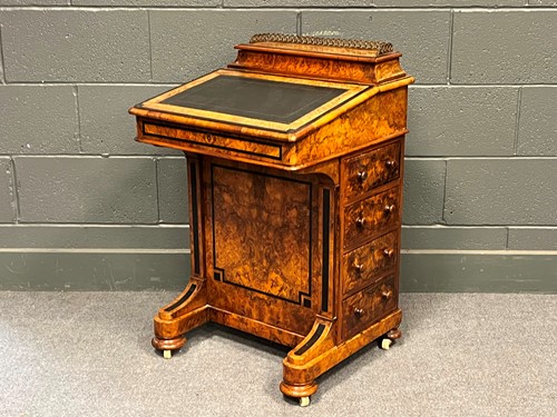 Lot 712 - A Victorian burr walnut Davenport desk, with...